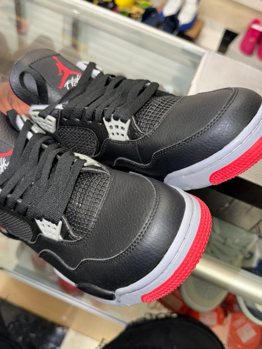 Jordan Men’s Black/Red/White Retro 4 Sneakers